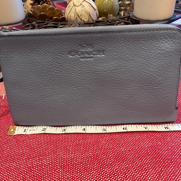 Coach Handbags - Flawless, baby blue leather, large Coach wristlet.